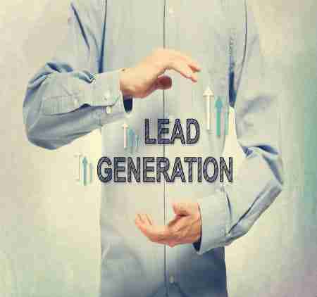 Man with lead generation graphic between hands.
